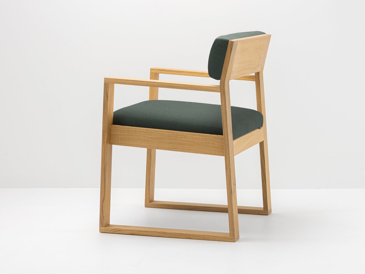 Fauteuil design en tissu vert